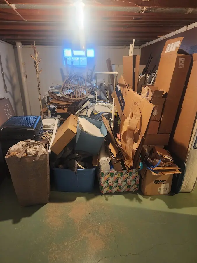 Roll-off dumpster container at job site for Yard Waste Dumpster Rental in St. Clair